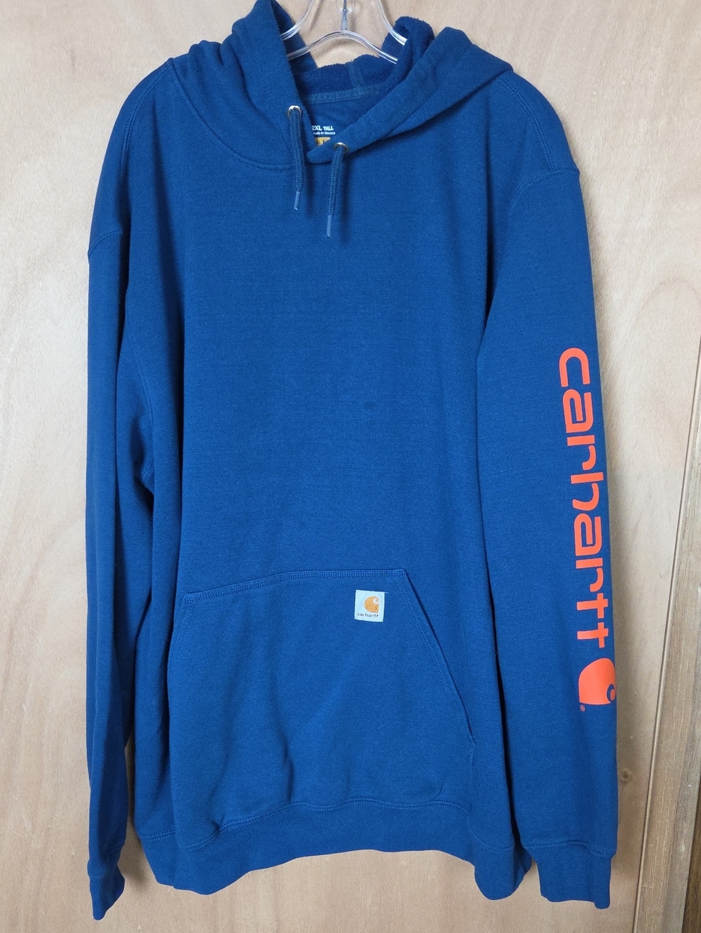 Carhartt Blue Pullover Hoodie with Orange Sleeve Logo